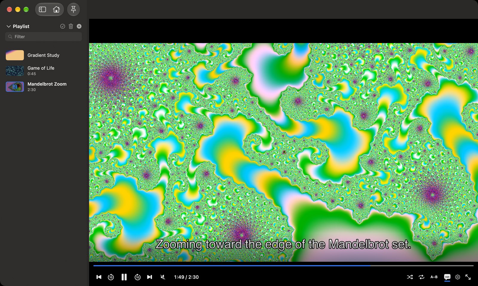 The Media Player window playing a Mandelbrot zoom video with subtitles, a playlist sidebar of three videos, and YouTube-style transport controls